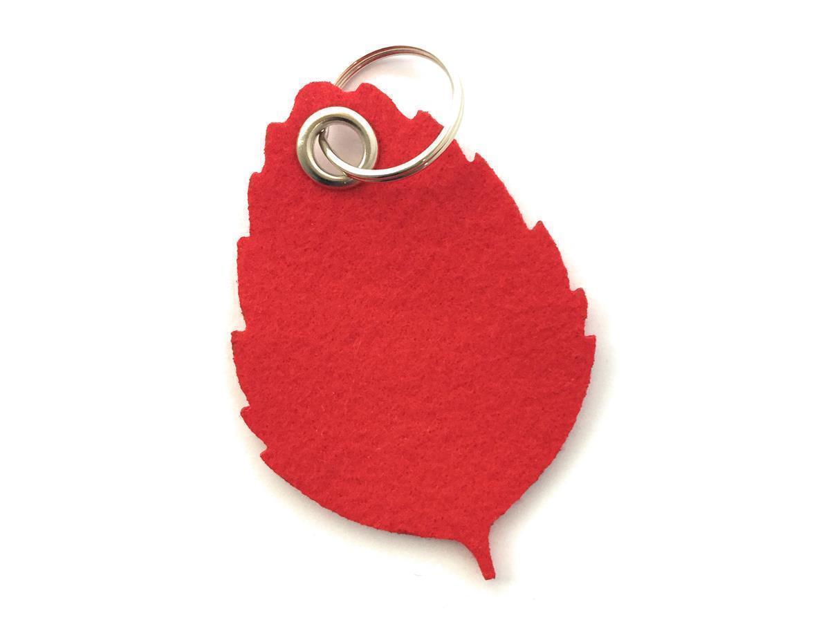 Blatt No1 - Schlüsselanhänger Filz in rot - Druck / Gravur Blatt No1 - Schlüsselanhänger Filz in rot mit Druck 4-fbg