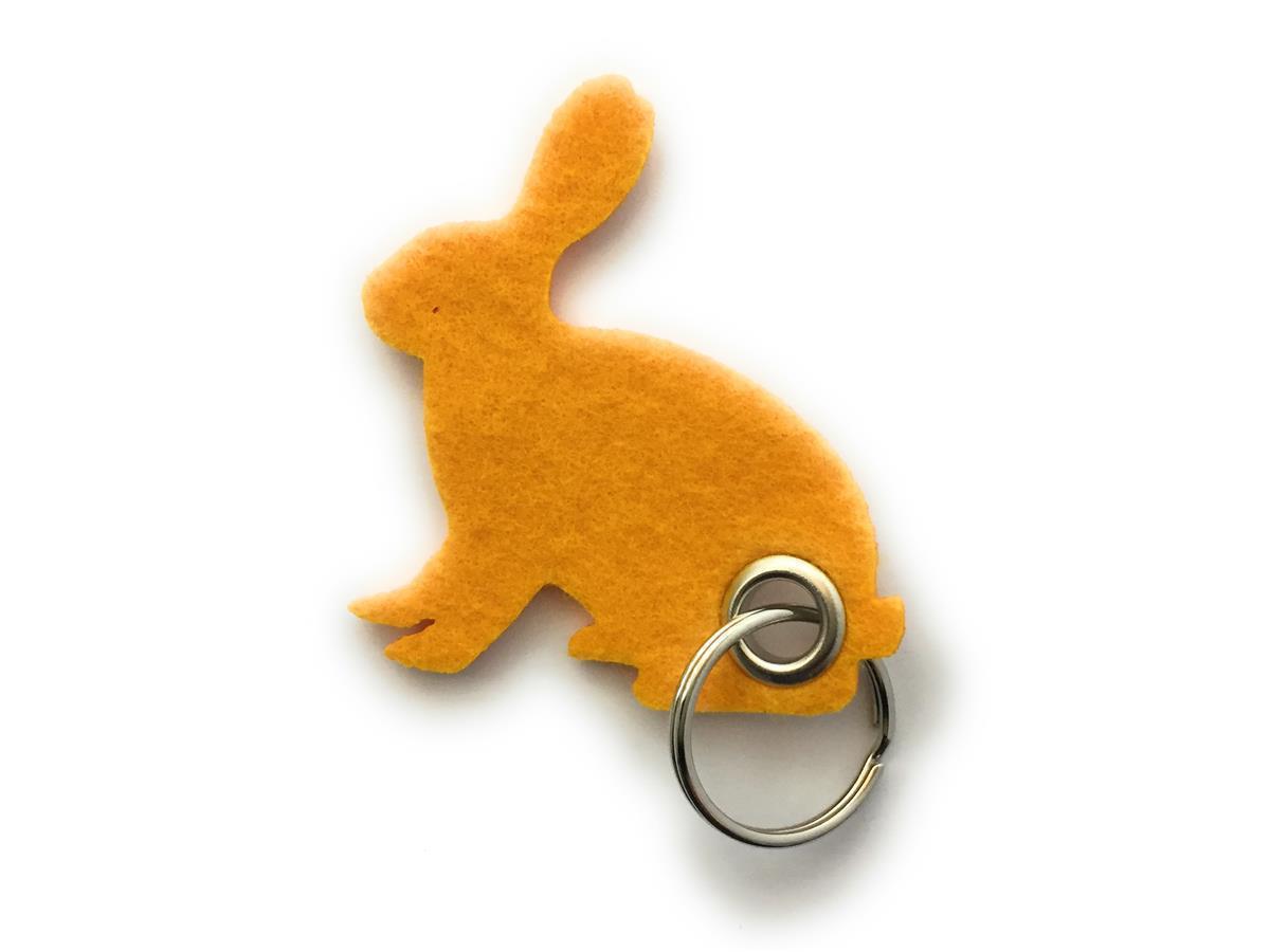 Hase sitzend - Schlüsselanhänger Filz in gelb - Druck / Gravur Hase sitzend - Schlüsselanhänger Filz in gelb mit Druck 4-fbg