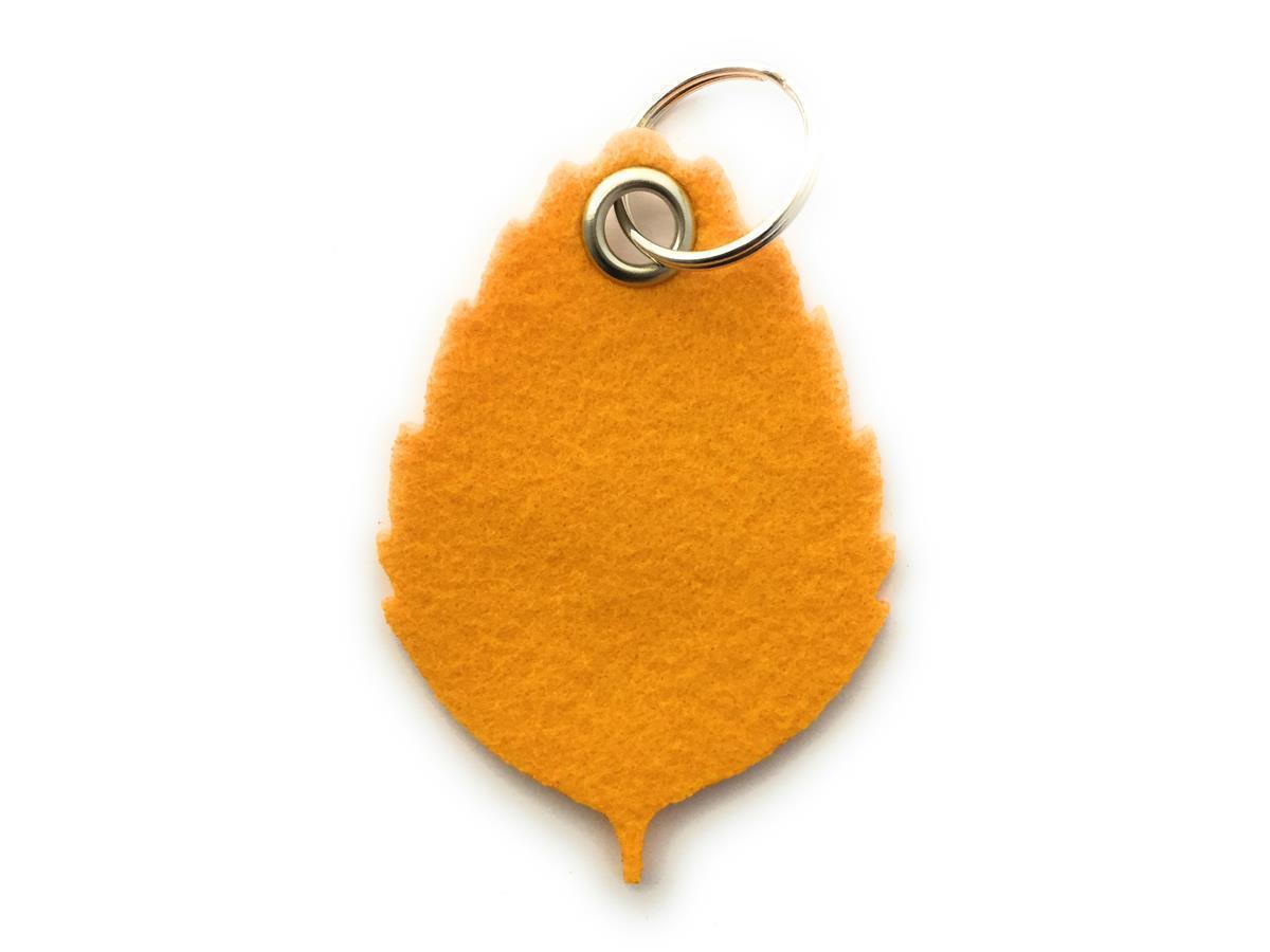 Blatt No1 - Schlüsselanhänger Filz in gelb - Druck / Gravur Blatt No1 - Schlüsselanhänger Filz in gelb mit Druck 4-fbg