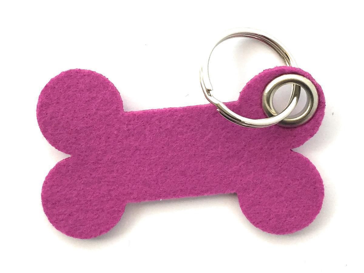 Knochen - Schlüsselanhänger Filz in magenta mit Druck 4-fbg