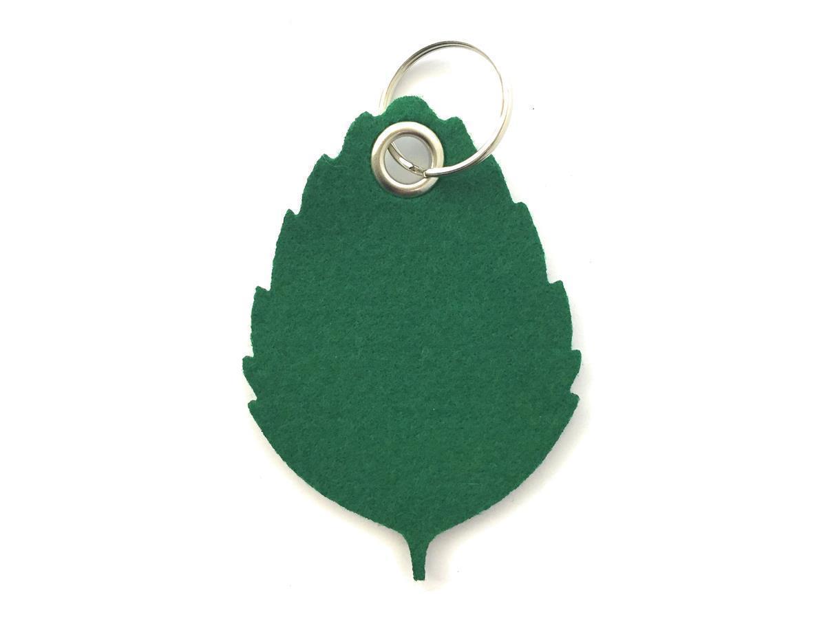 Blatt No1 - Schlüsselanhänger Filz in waldgrün - Druck / Gravur Blatt No1 - Schlüsselanhänger Filz in waldgrün mit Druck 4-fbg